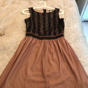 A brand new speechless dress with the tags on it